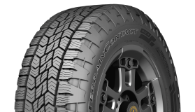 Continental Terrain Contact A/T 2 all-terrain tire shown at a three-quarter angle, featuring an aggressive tread pattern, black alloy wheel, and raised white sidewall lettering.